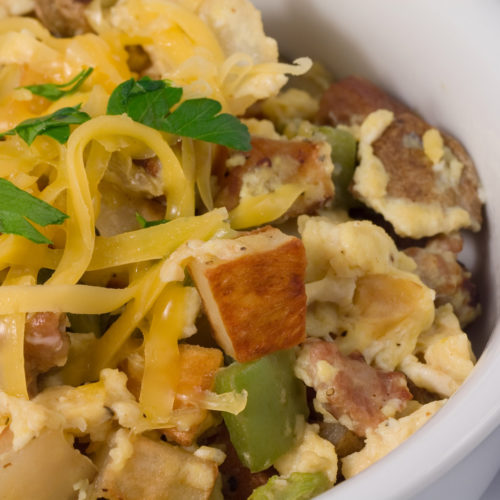 Breakfast scramble in white bowl.