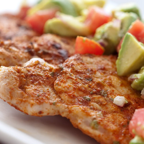 Chili rubbed pork chops with avocado salsa.