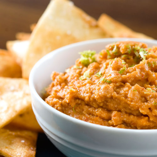 Chipotle hummus in white bowl.