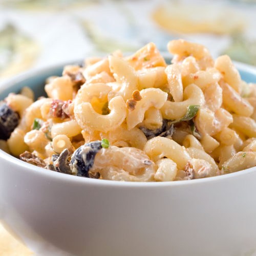 Chipotle macaroni salad in white bowl.