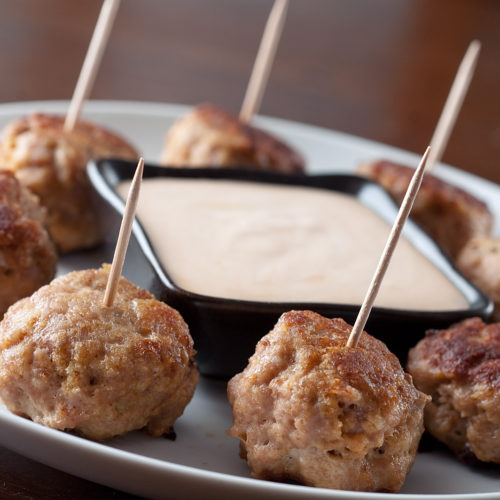 Chipotle turkey meatballs with toothpicks.