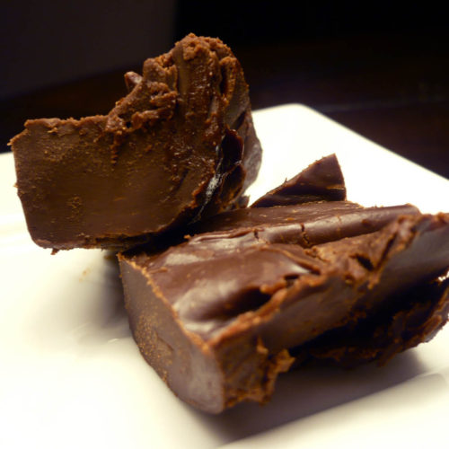 2 pieces of mint fudge on white plate.