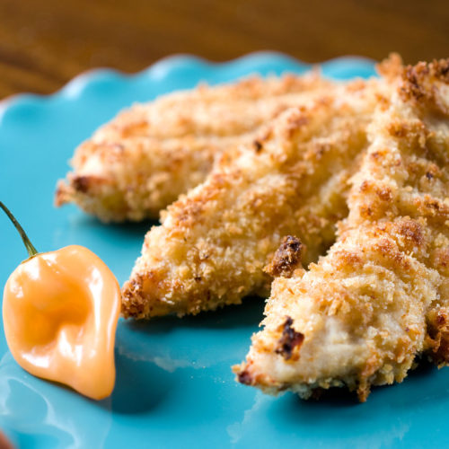 habanero chicken tenders on teal plate.