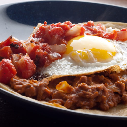 huevos rancheros on plate.