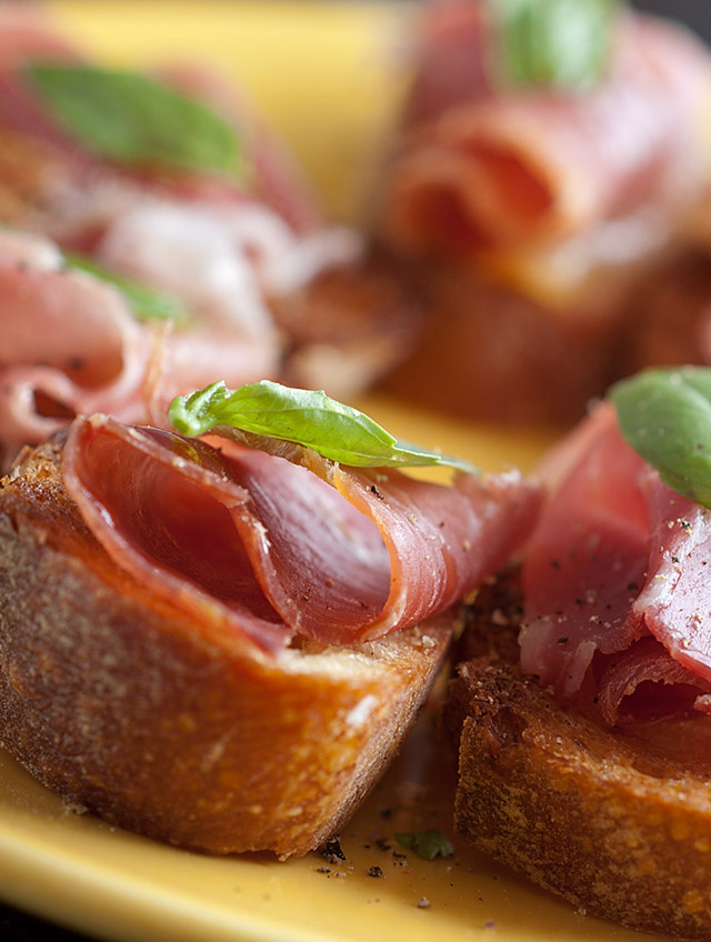 Prosciutto and Basil Crostini