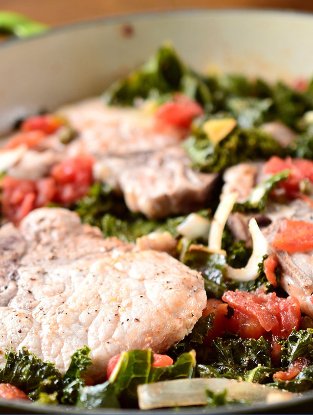 Braised Pork Chops with Kale and Tomatoes
