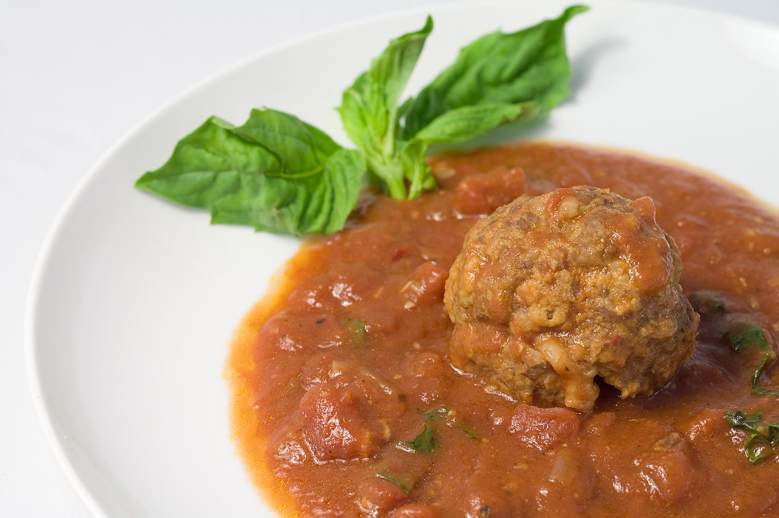 Roasted Garlic and Mozzarella Meatballs with Tomato-Basil Marinara