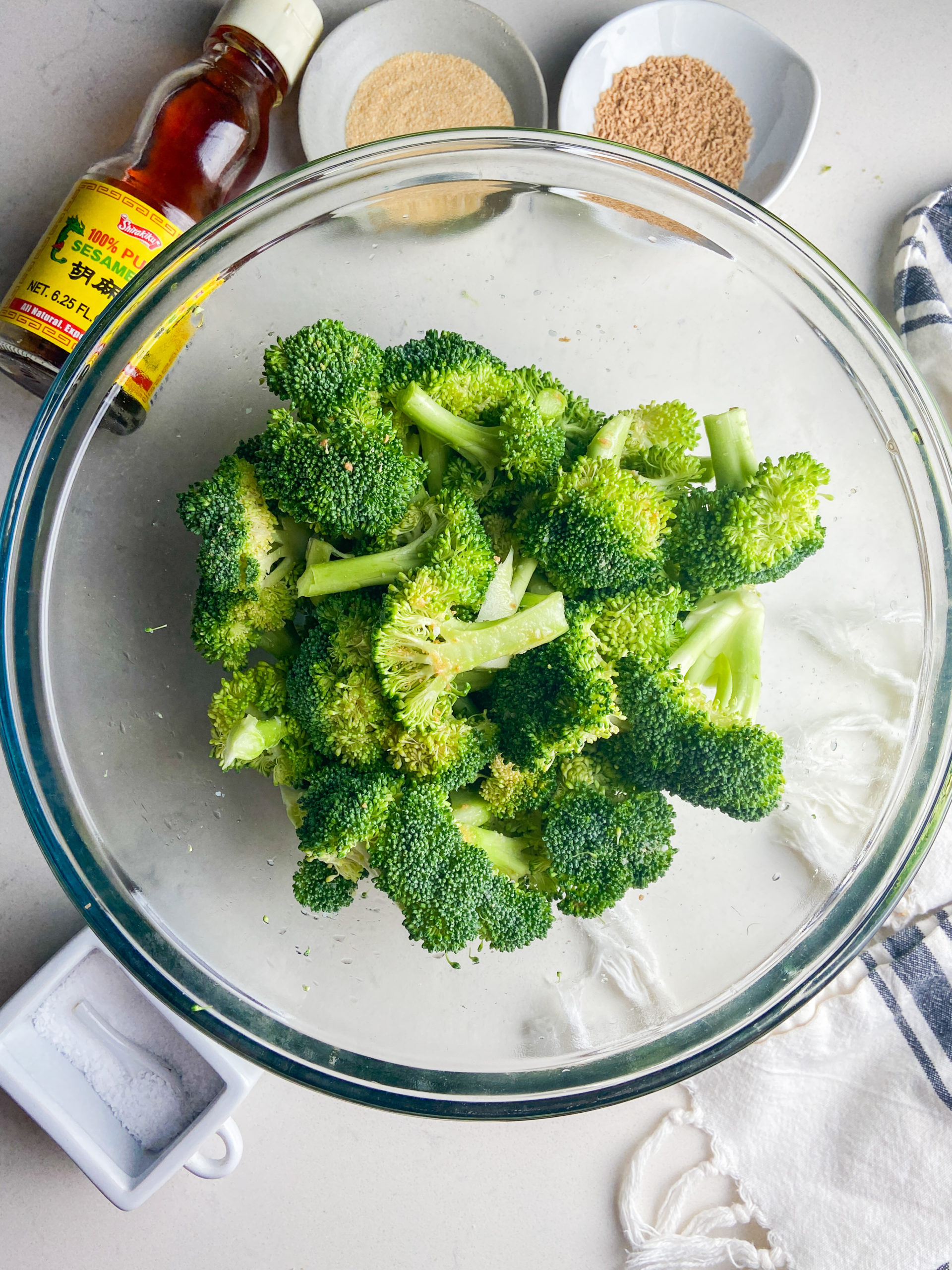 Broccoli in a clear glass bowl. 