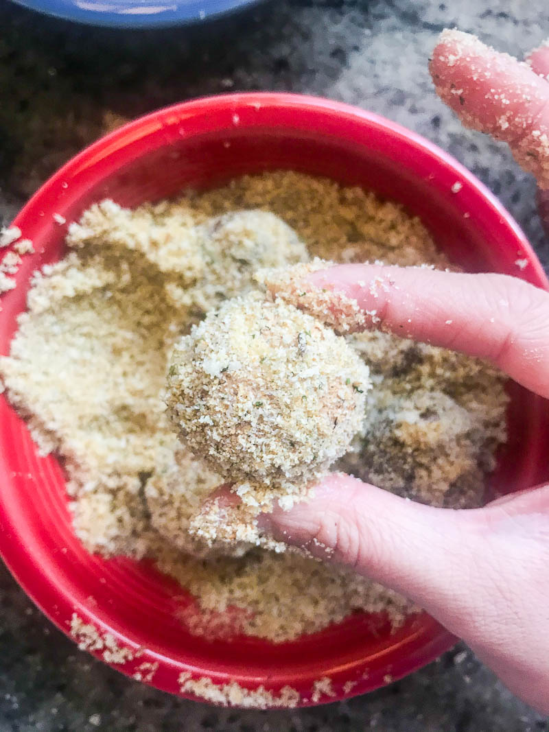 Dip mushrooms in wet ingredients then dry to help bread crumbs stick. 