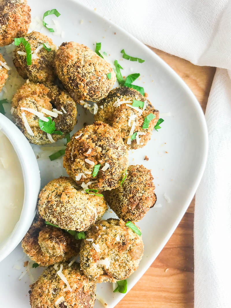 Crispy breaded air fryer mushrooms are lighter than traditional fried mushrooms and ready in under 10 minutes! Easy, delicious and perfect for game day!