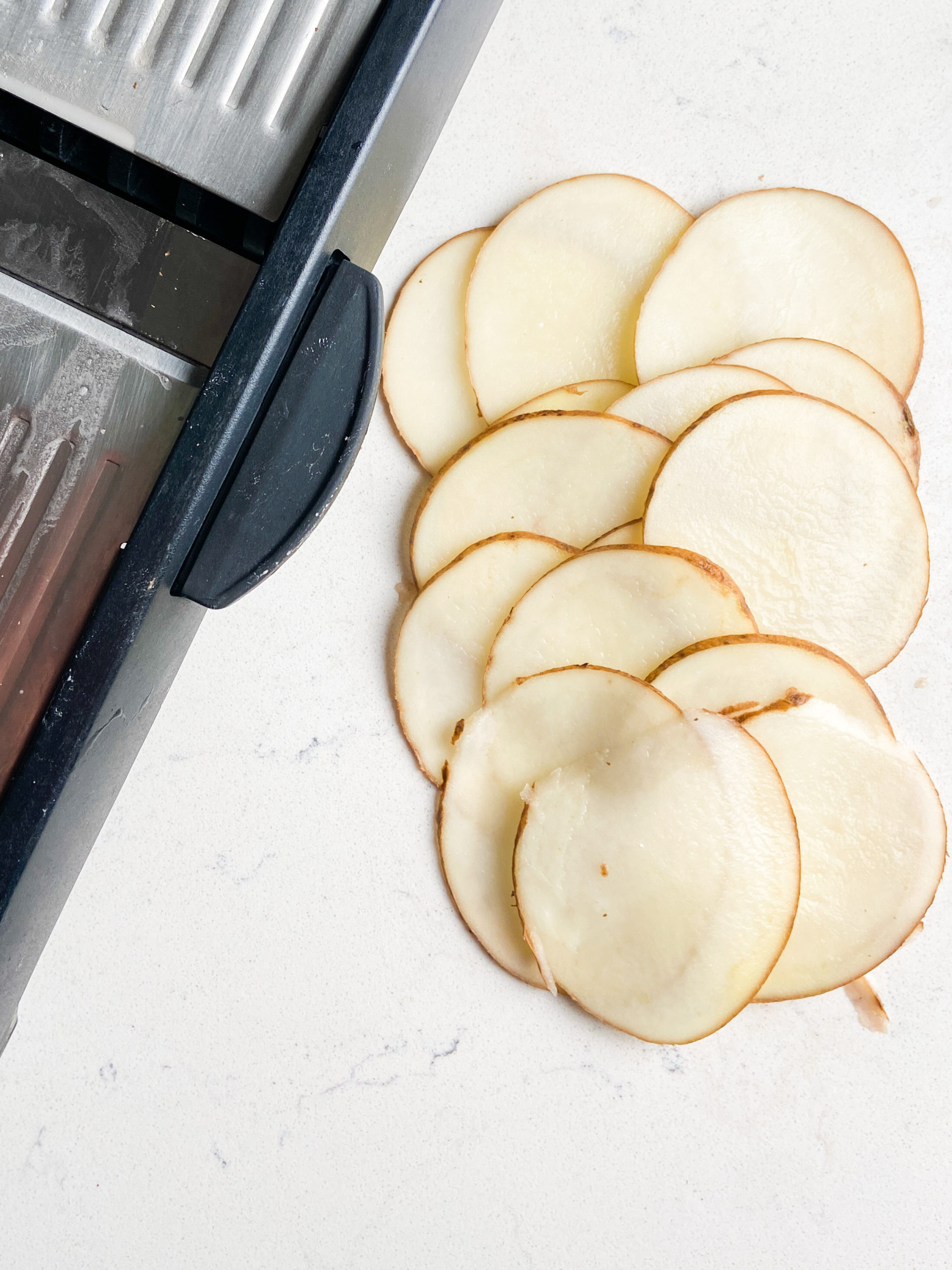 Potato slices cut with  mandolin