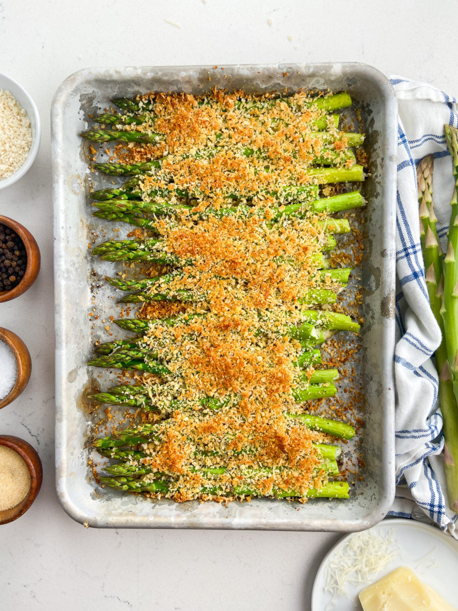 Baked asparagus on a baking sheet. 