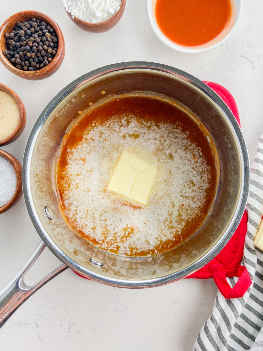 Wing sauce in pan. 