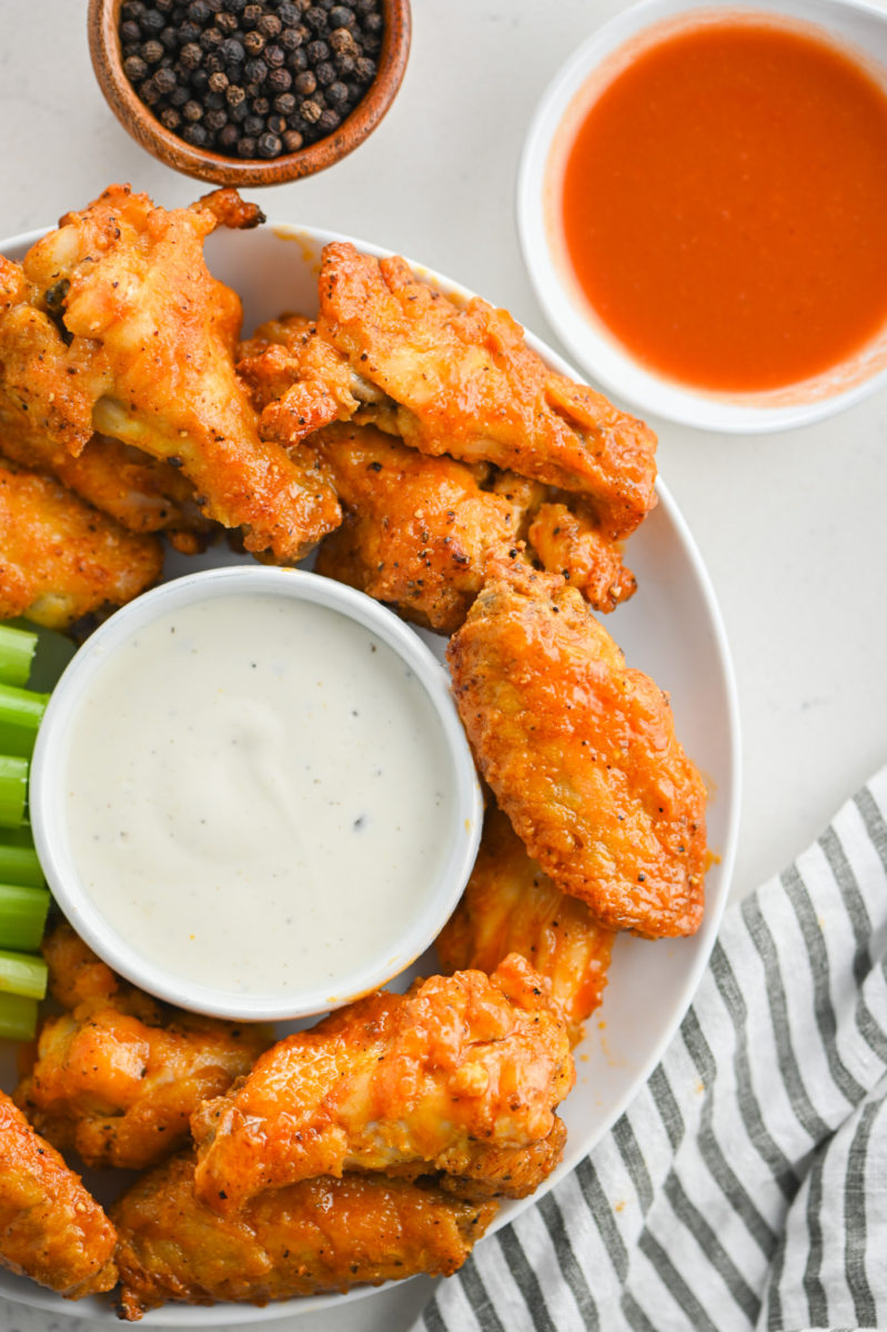 Buffalo wings on a plate.