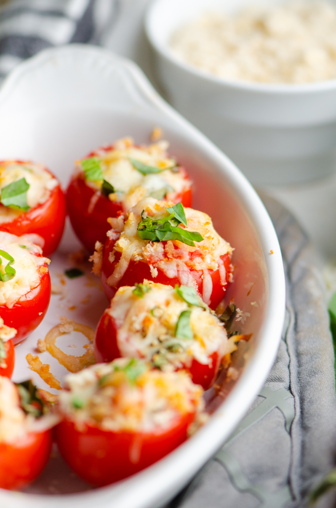 Side photo of baked stuffed tomatoes. 
