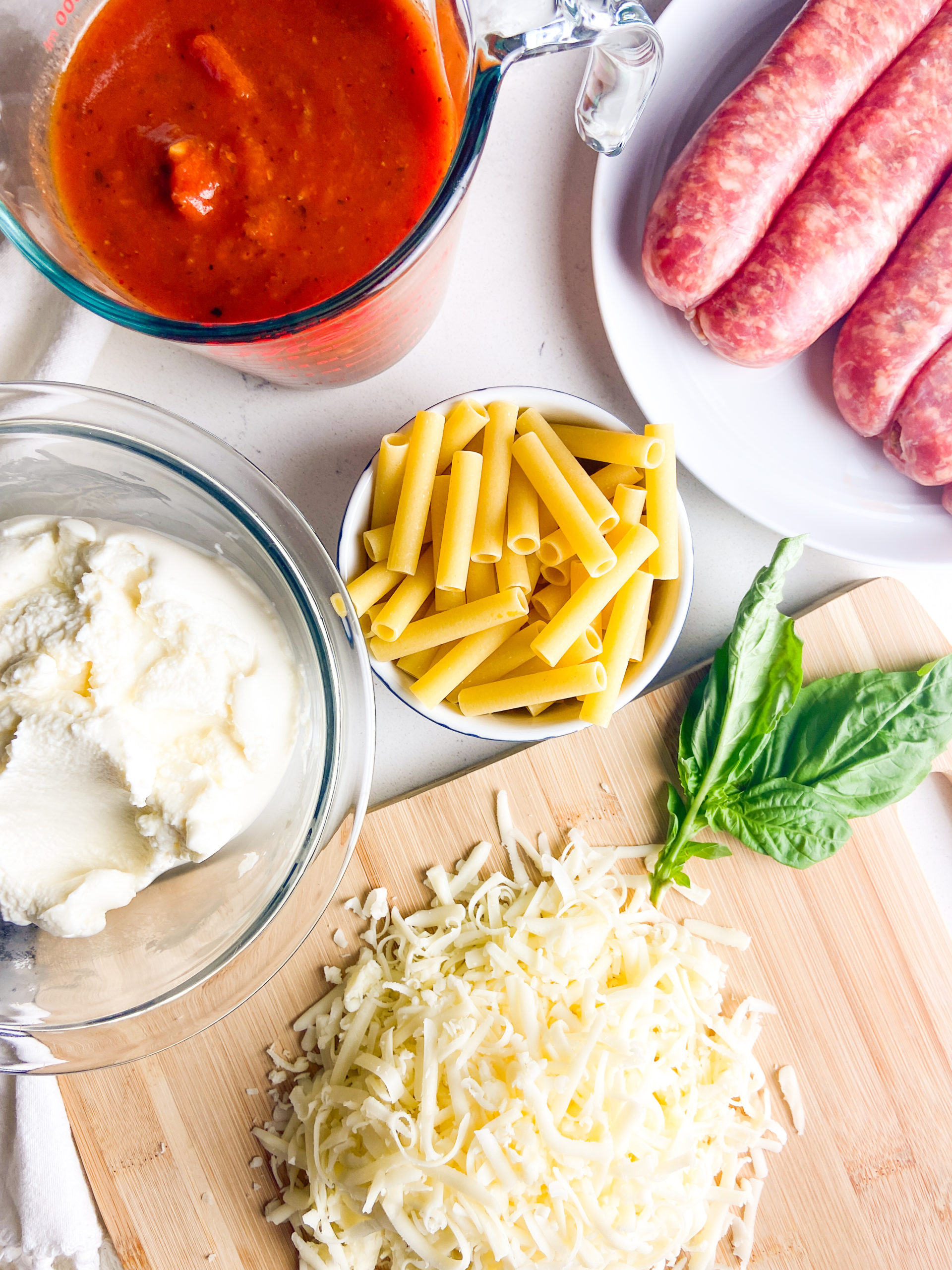 Ingredients for baked ziti with italian sausage. 