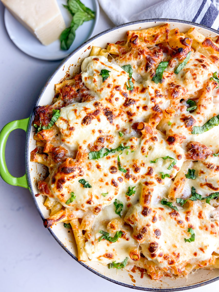 Baked ziti with sausage in a skillet. 