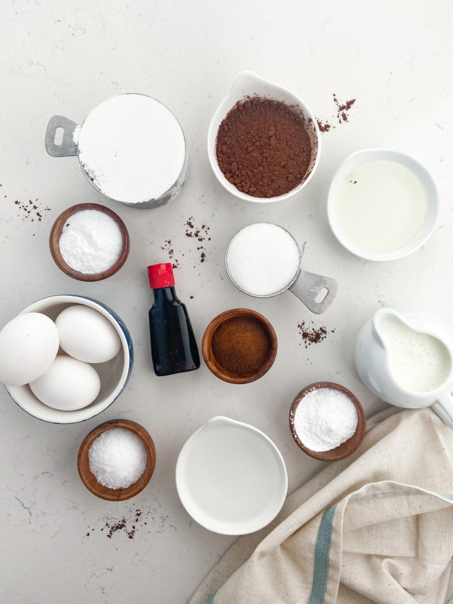 Overhead photo of white chocolate cake ingredients. 