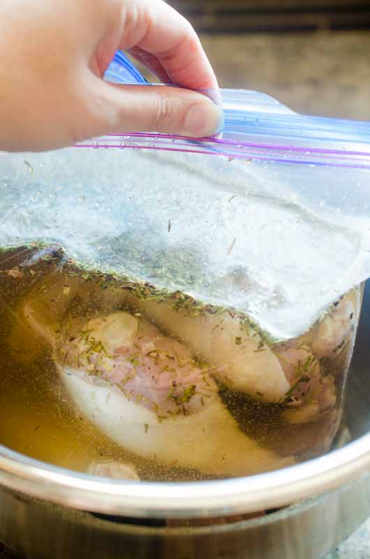 Chicken in a brine in a resealable plastic bag. 