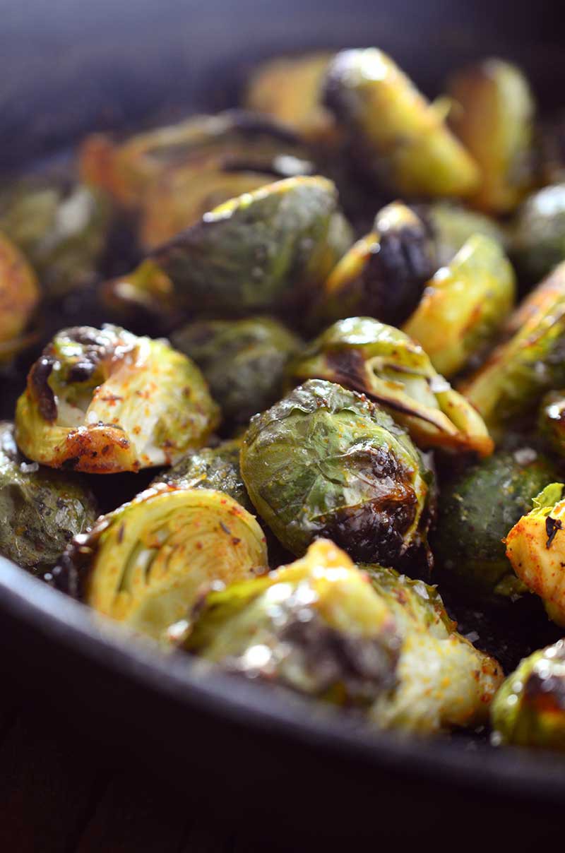 Crispy cajun roasted brussels sprouts are a perfect way to spice up your holiday menu.