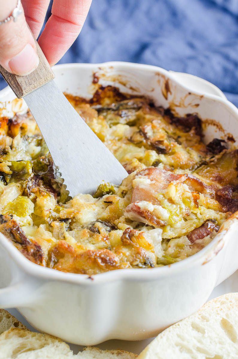 Cheesy Brussels sprouts dip with garlic and white cheddar cheese is life changing! This easy dip recipe will make a Brussels sprouts lover out of everyone! 