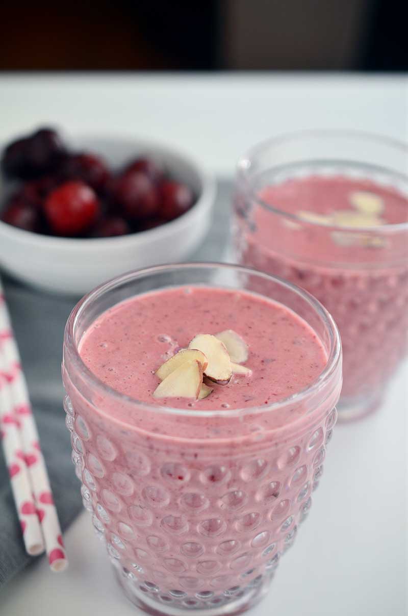 This Cherry Almond Smoothie loaded with kefir, greek yogurt, sweet cherries and almond butter is a great way to start the day! 