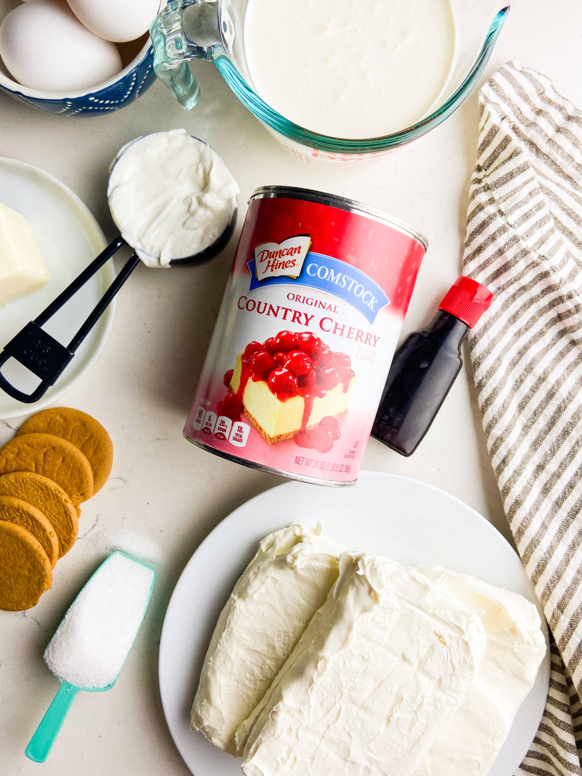 Overhead photo of ingredients needed for Cherry Cheesecake. 