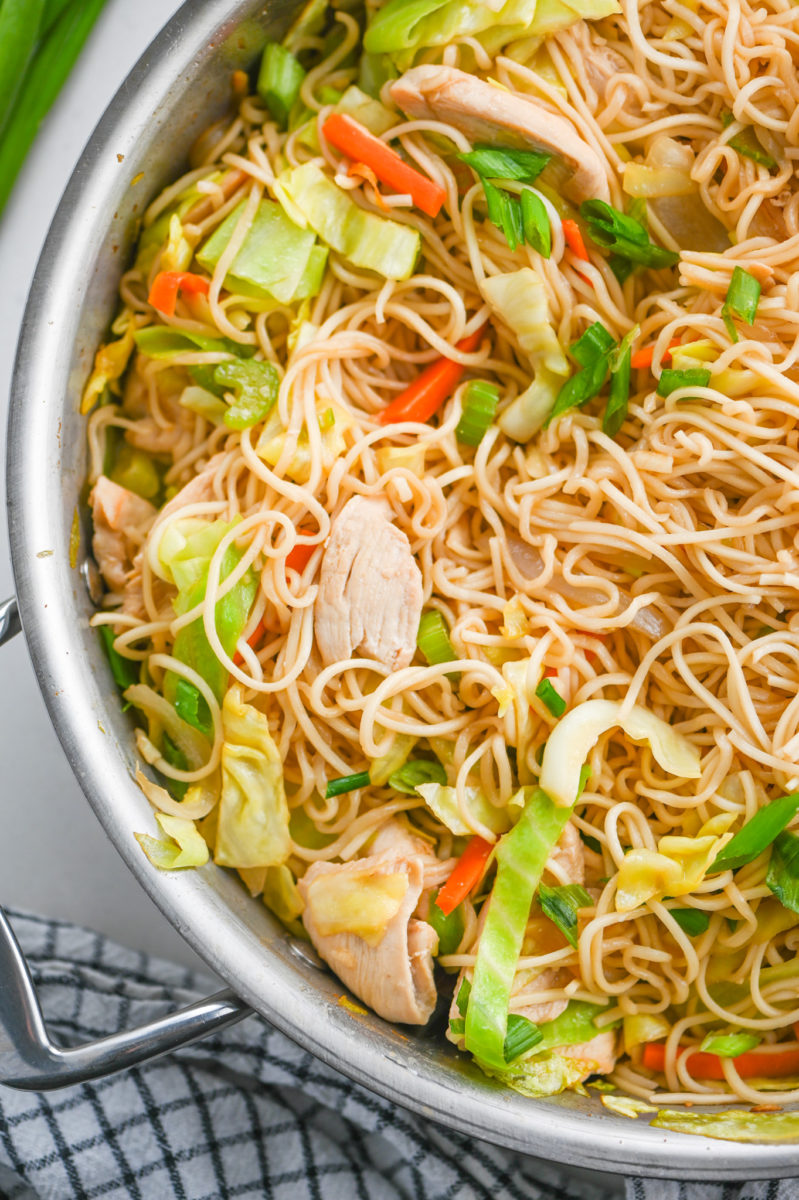 Chicken chow mein in stainless steel pan. 