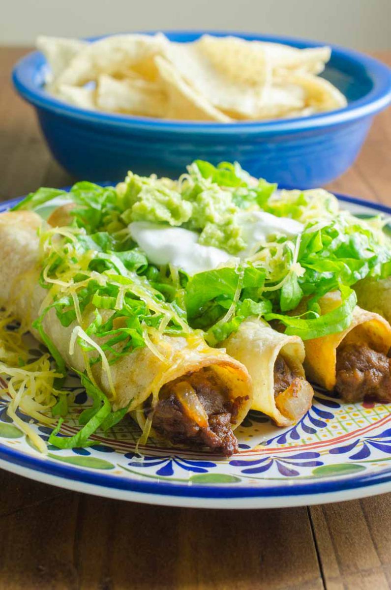 Chorizo & Black Bean Taquitos are crispy oven baked taquitos filled with chorizo, black beans and pepper jack cheese.