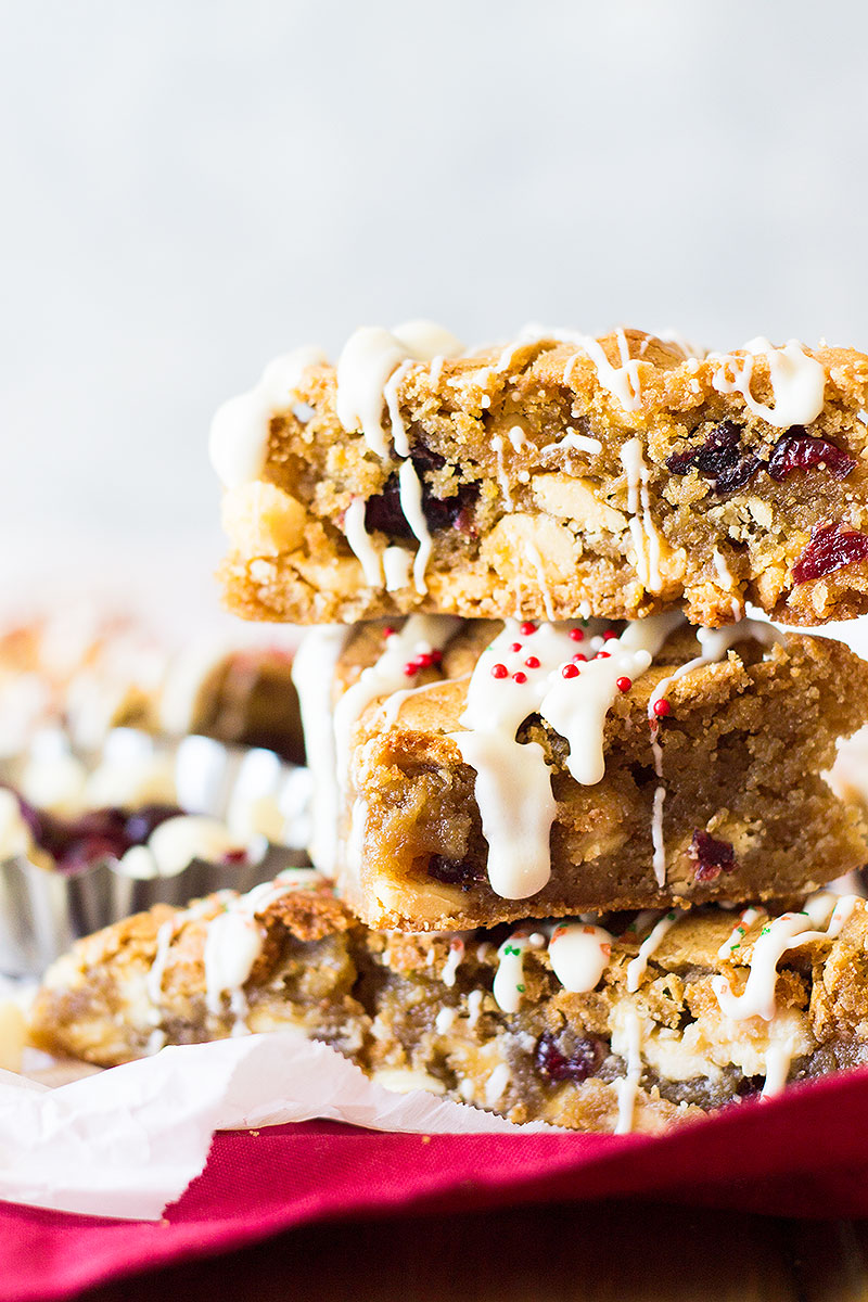 These Christmas Blondies are chewy and full of white chocolate and dried cranberries for that perfect sweet and tart combo! 