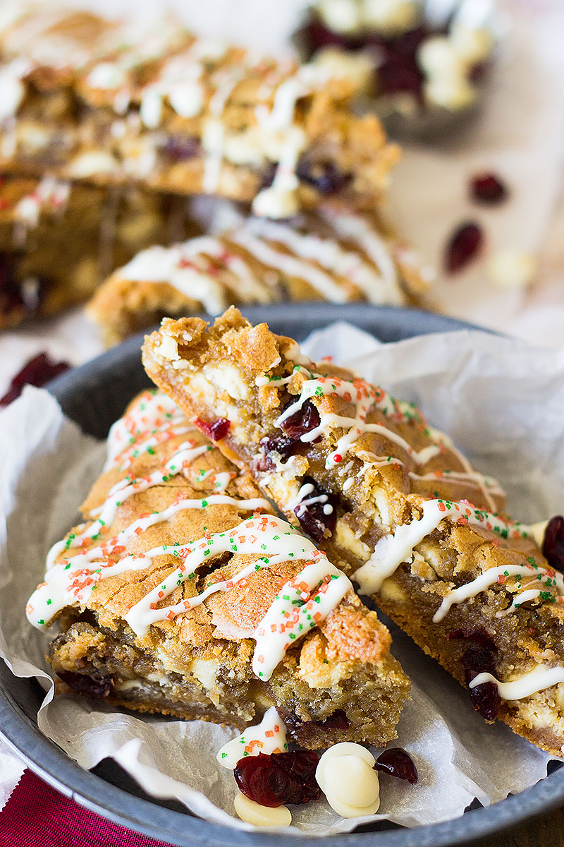 These Christmas Blondies are chewy and full of white chocolate and dried cranberries for that perfect sweet and tart combo! 