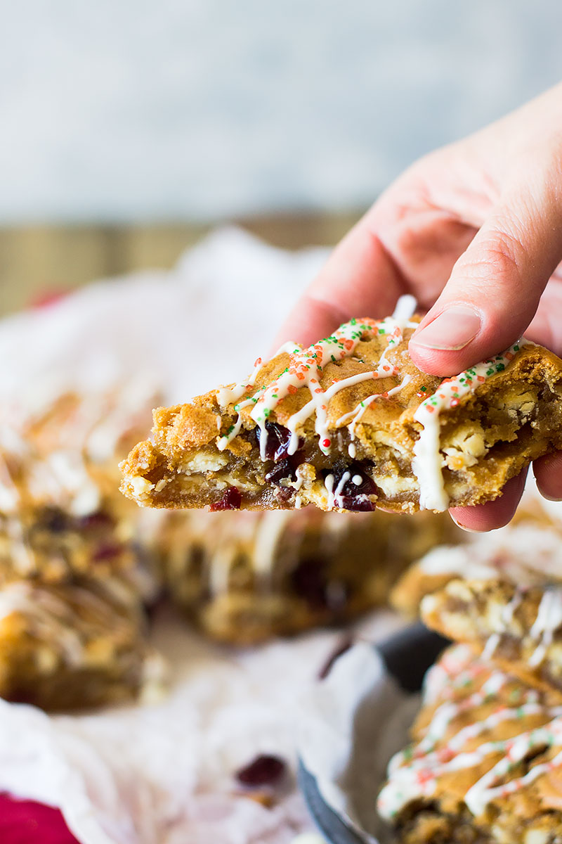 These Christmas Blondies are chewy and full of white chocolate and dried cranberries for that perfect sweet and tart combo! 