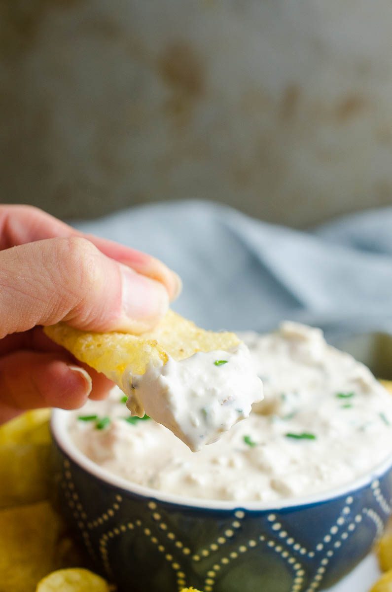 This classic creamy clam dip is perfect for summer potlucks. It's even better after it sets so it's perfect for making ahead! 