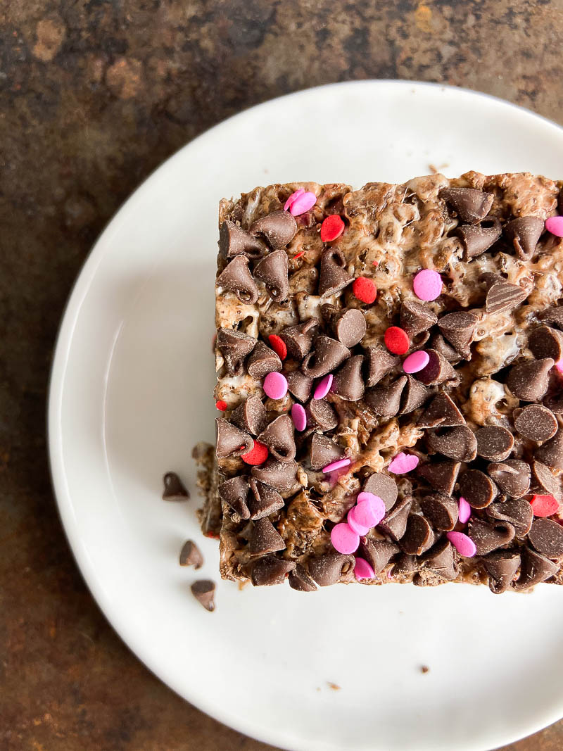 Cocoa Pebble Treats on a white plate.