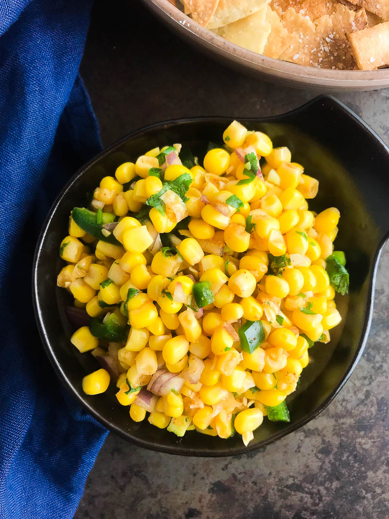 This Easy Corn Salsa recipe makes the perfect addition to tacos, chips and even salads. It comes together in a flash and is a total crowd pleaser. 