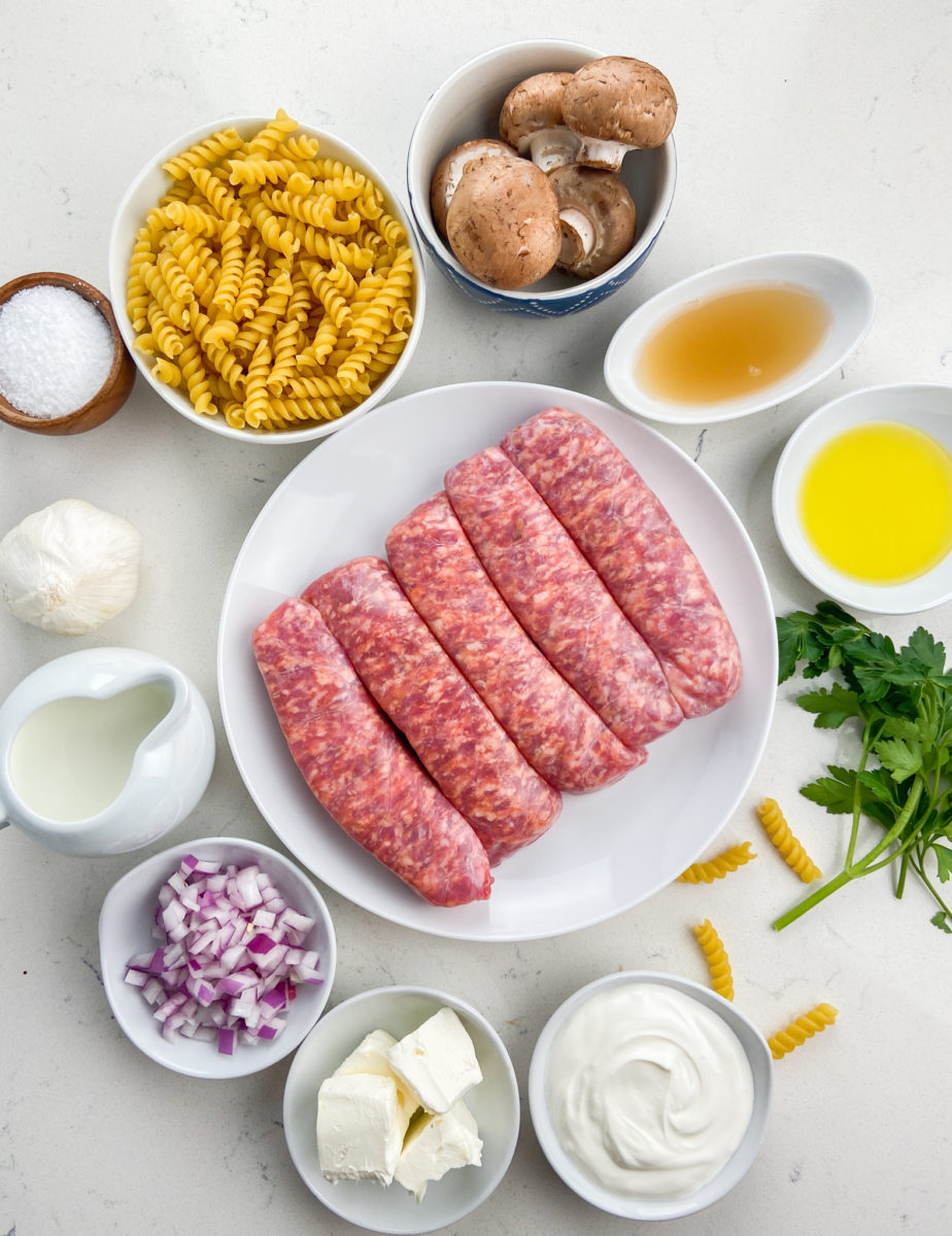 Overhead photo of creamy mushroom pasta ingredients. 