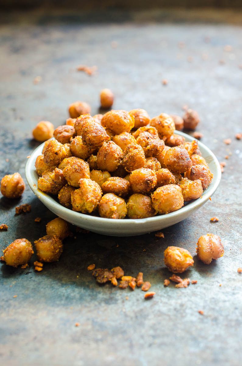 Crispy Chickpeas are an easy, versatile snack. These Crispy Chickpeas are pan fried and tossed in taco seasoning. Eat them as a snack or in a taco shell for a vegetarian taco! 