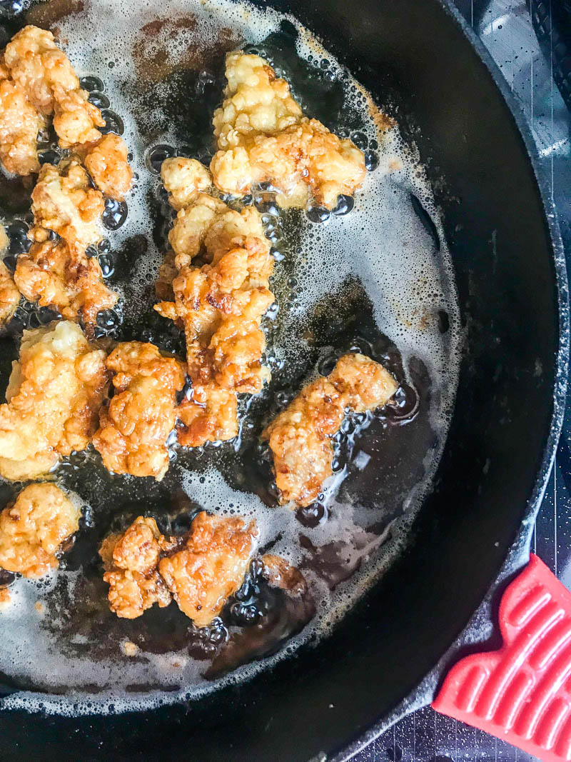 Popcorn chicken in a cast iron skillet