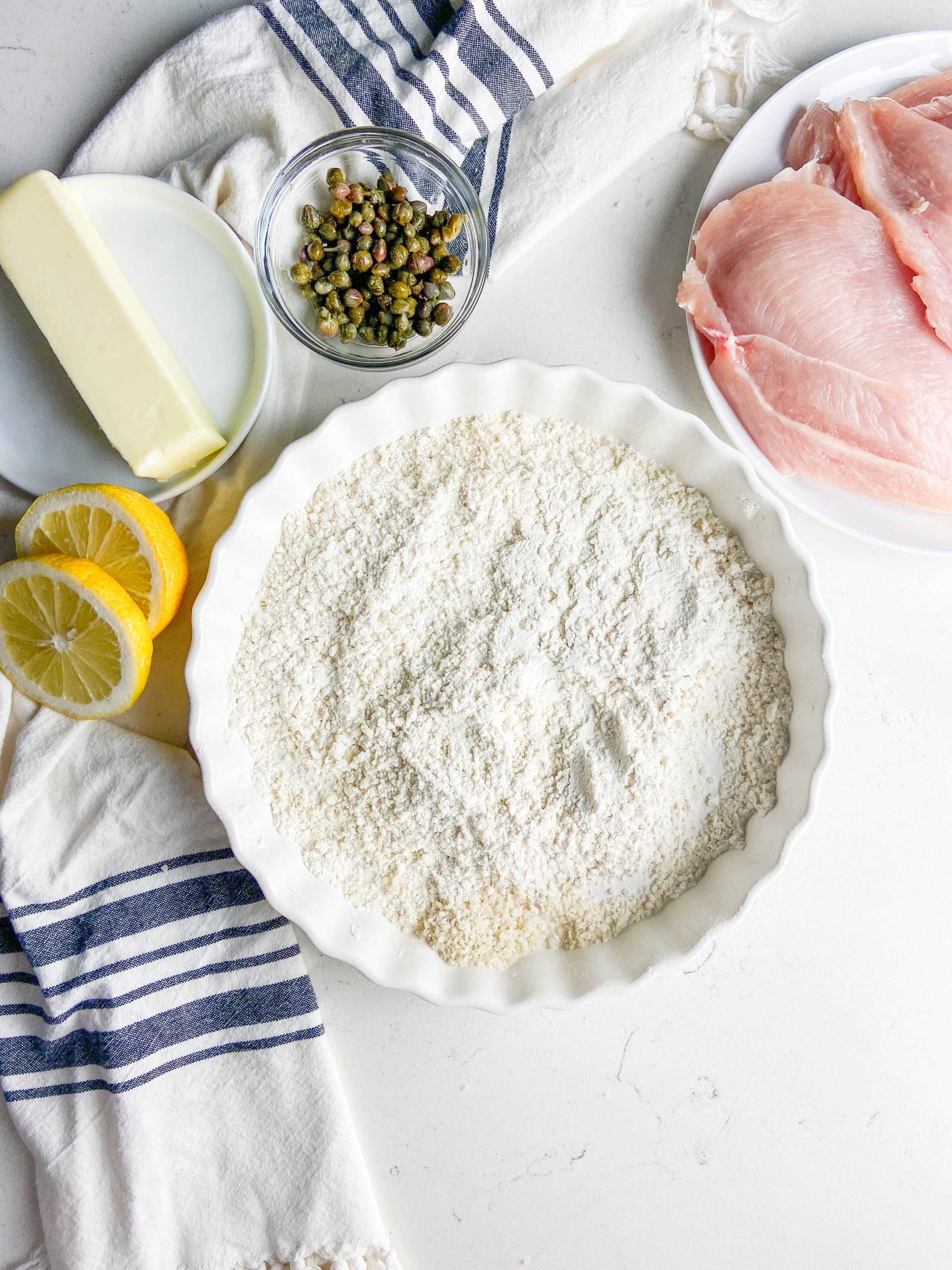 Ingredients needed for chicken piccata. 