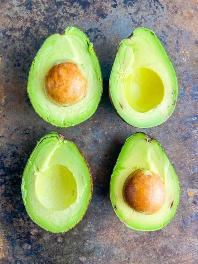 Overhead picture of avocados cut in half 