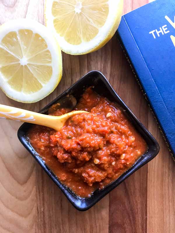 Easy Homemade Harissa is super easy to make. A blend of red bell peppers, fresno peppers and spices, this chile paste is favorite for spice lovers!
