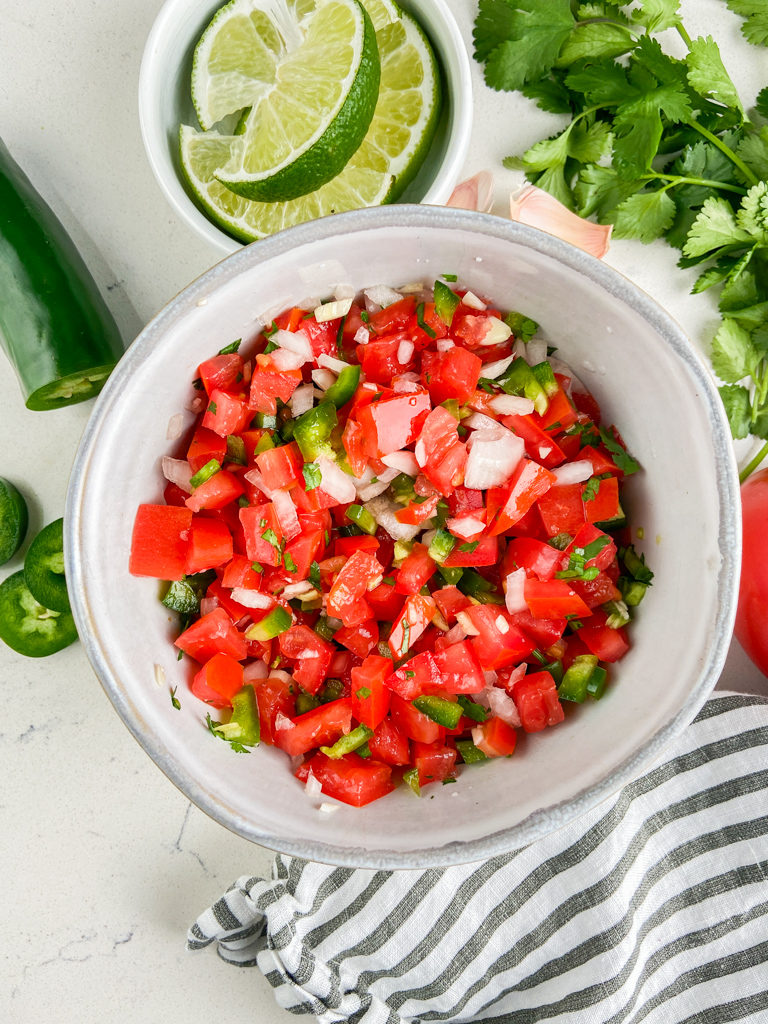 Overhead photo of pico de gallo in a bowl. 