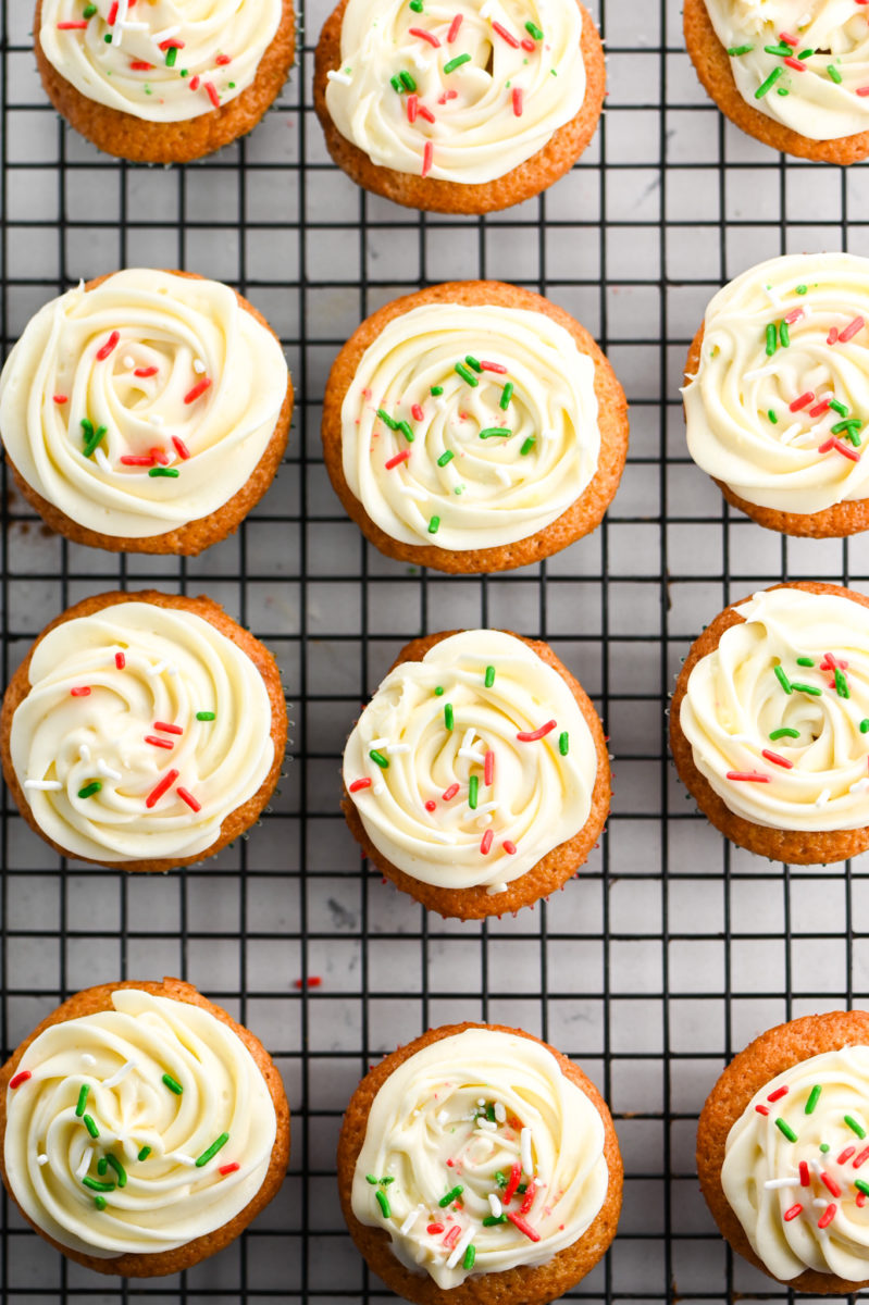 eggnog cupcakes on wire rack. 