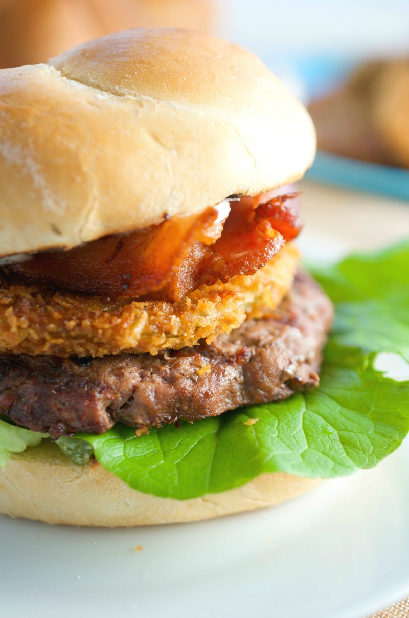This burger gets a southern twist with bacon and a fried green tomato. Perfect way to use summer garden tomatoes! 