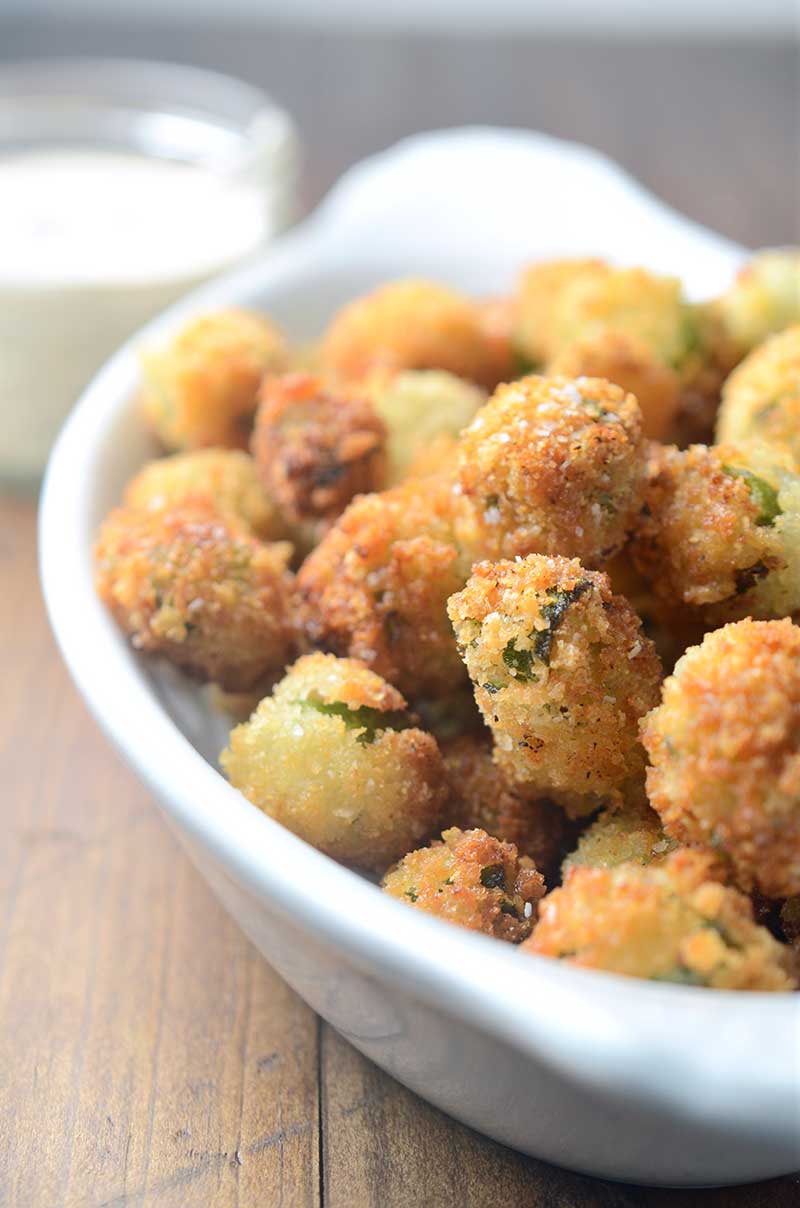 A classic southern dish, Fried Okra is crispy and addicting. A cajun dipping sauce gives it the perfect amount of kick!
