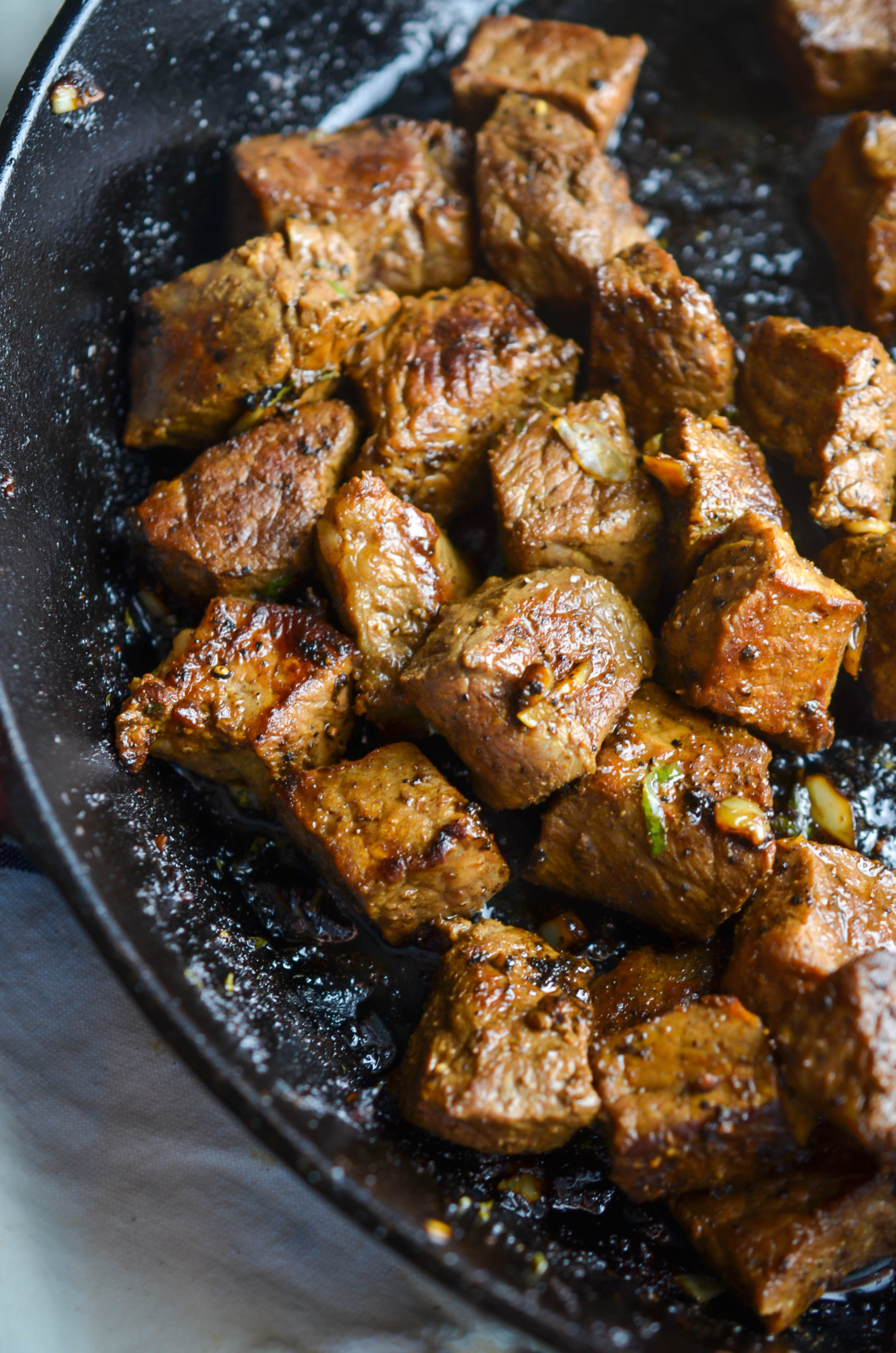 Steak bites in a skillet. 