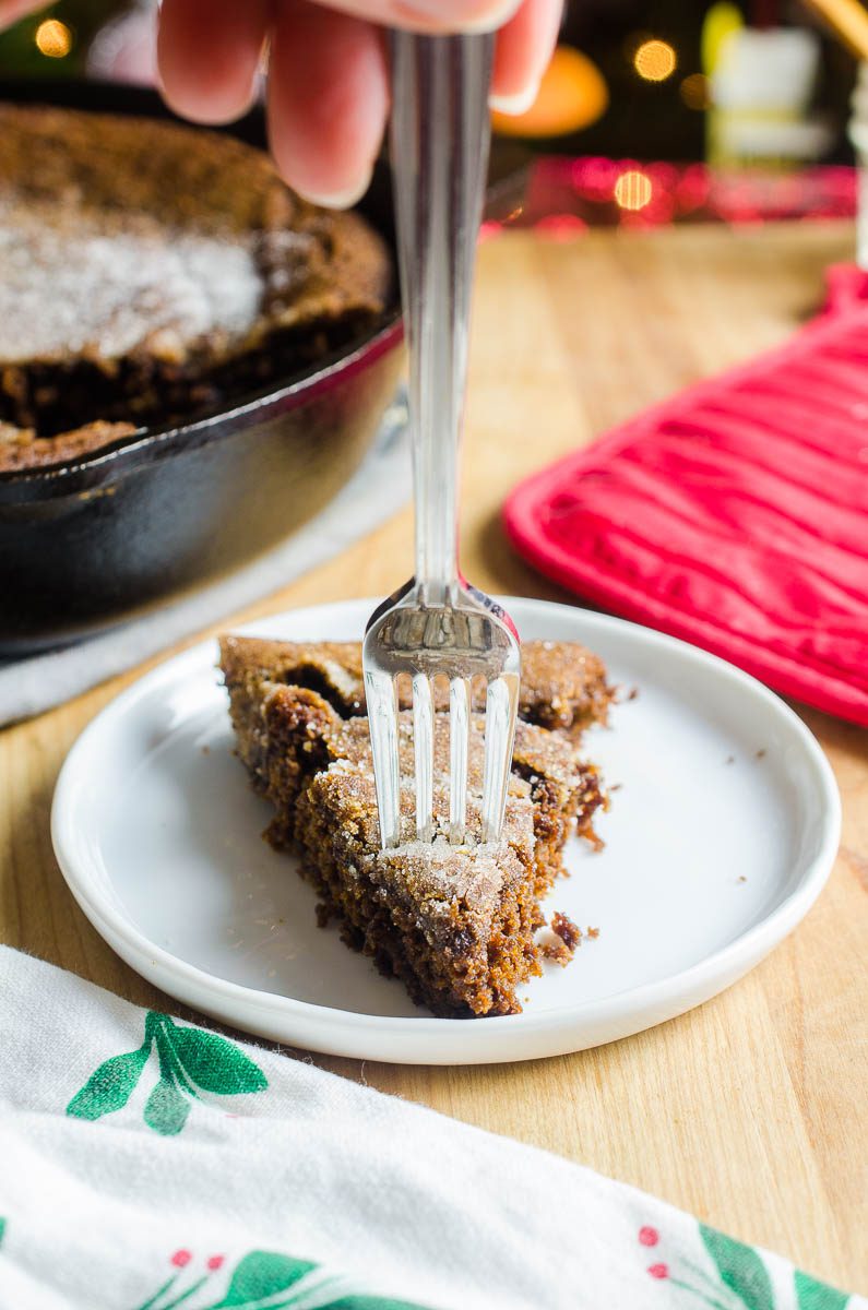 What is better than a soft and chewy gingersnap cookie? A big ol' soft and chewy Gingersnap Skillet Cookie of course! This festive dessert is perfect for entertaining! 