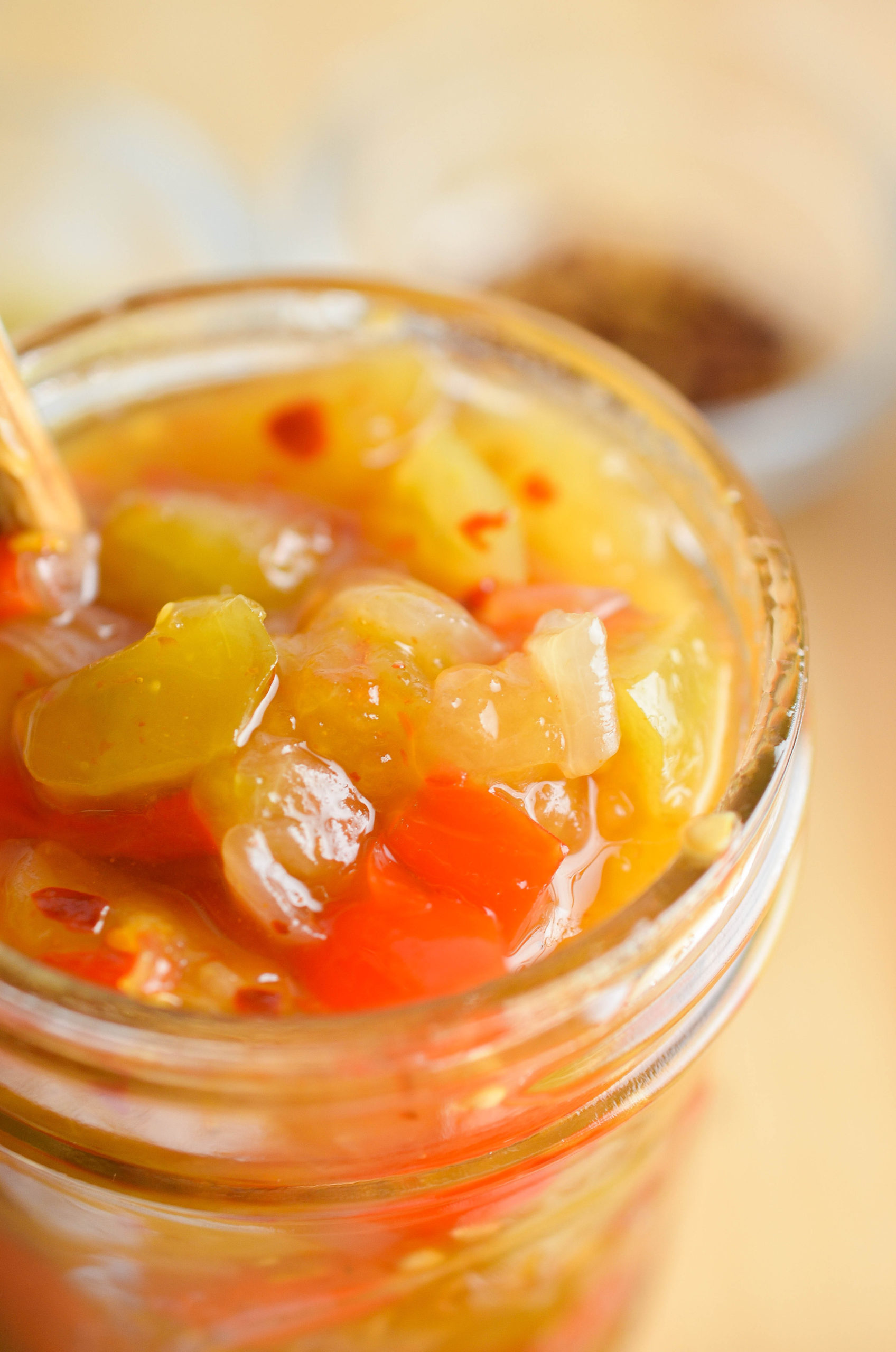 Green tomato relish in a glass jar. 