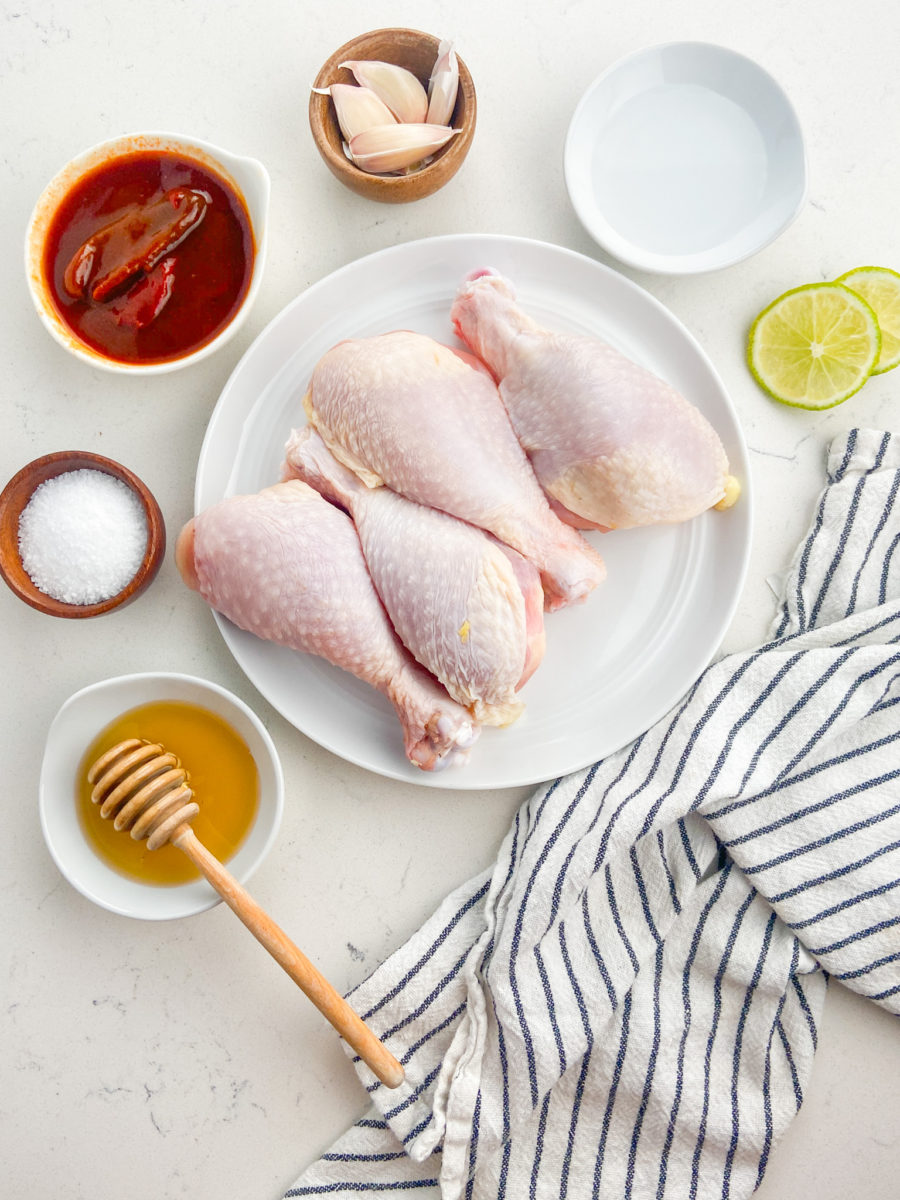 Grilled chipotle chicken ingredients on white background. 