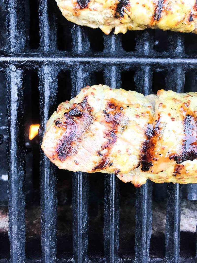 Pork tenderloin on grill. 